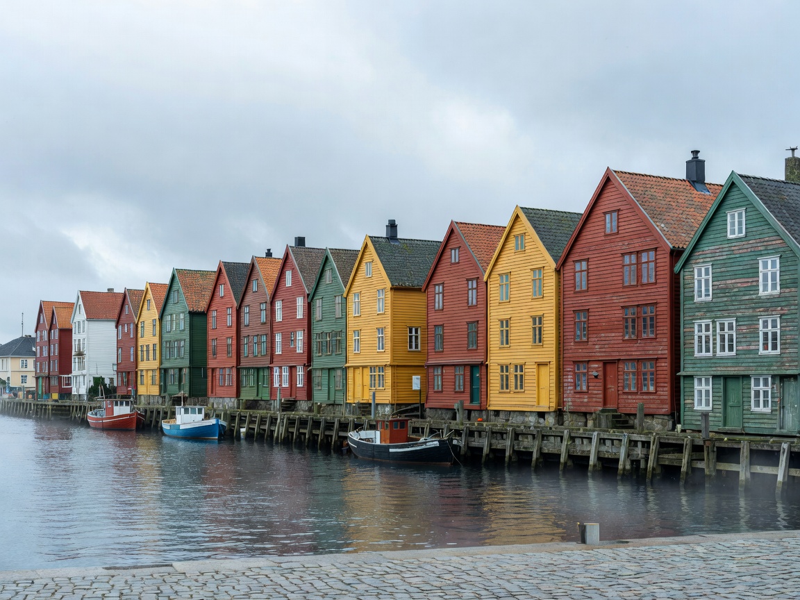 Historic colorful wooden merchant houses of Bryggen wharf along Bergen harbor
